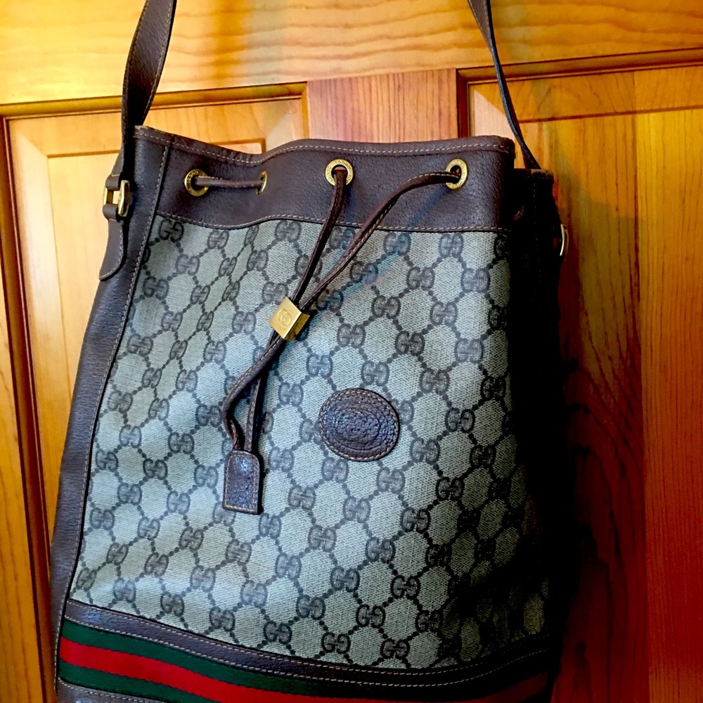 Authentic vintage Gucci drawstring shoulder/tote bag. Will consider offer.